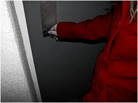 Jessica scrambles her key into doorlock