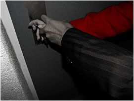 Out of nowhere a hand suddenly grabs hers stopping her from turning her key in the lock