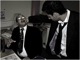 David punches Miller square in the jaw, knocking Miller's glasses off, before stalking out of the office