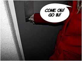 She fumbles with her key in the lock.