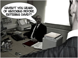 Miller, sitting in his executive chair at his desk angrily turns to David: 'Haven't you ever heard of knocking before David?!'