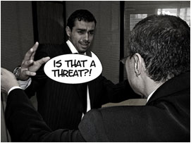 David pushes Miller's hands away from his jacket: 'Is that a threat?!'