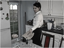 She then passes the letter over to David at the table.