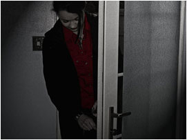 David's wife lets herself in through the door