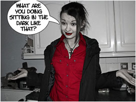 She composes herself: ;What are you doing sitting in the dark like that?