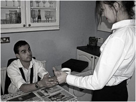 In the flashback David's wife is passing David his morning coffee, although it seems more sinister this time.