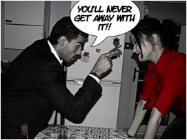 Back to the present. David jumps up and points agressively at his wife who is leaning cockily over the kitchen table: 'You'll never get away with it!'